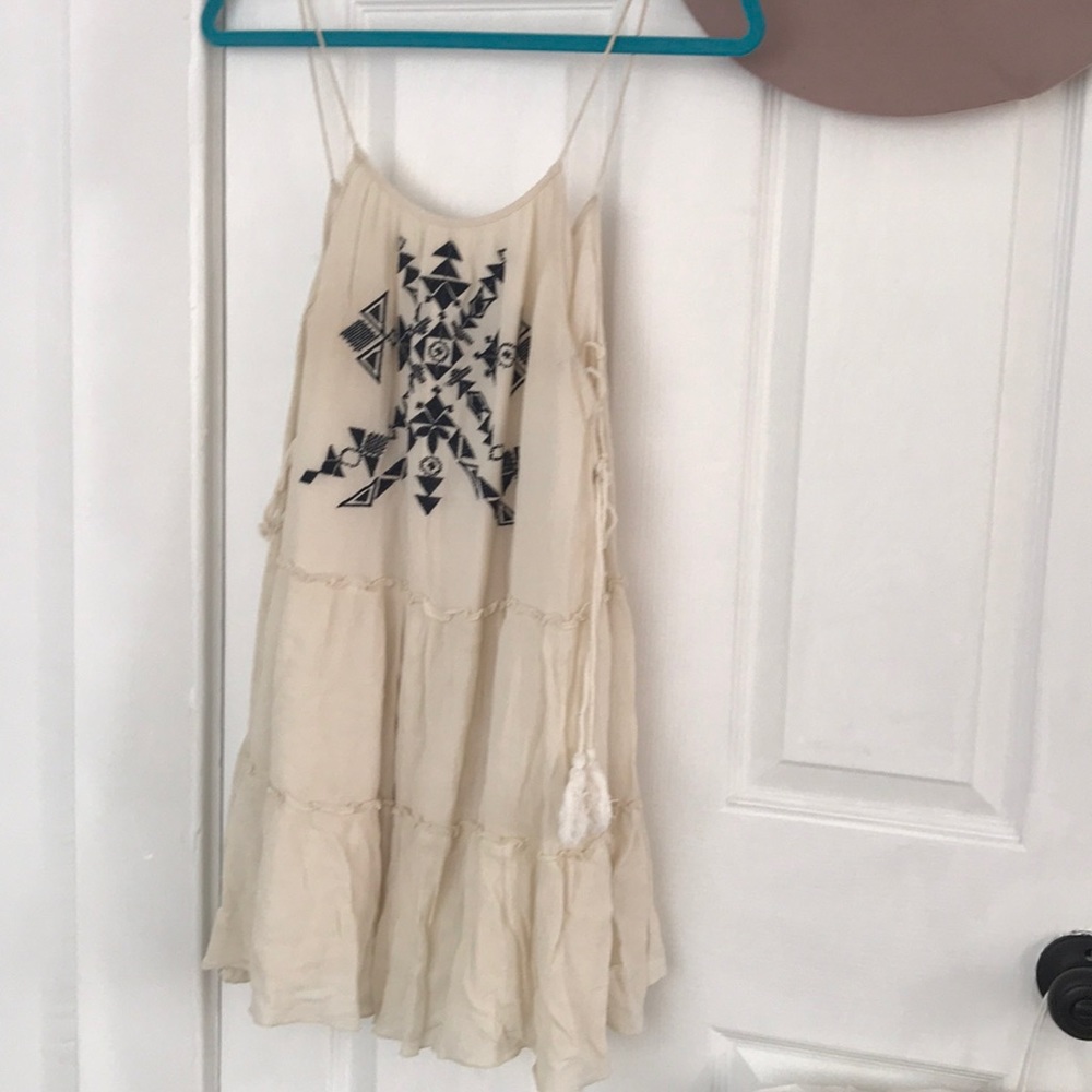 Embroidered cream dress
